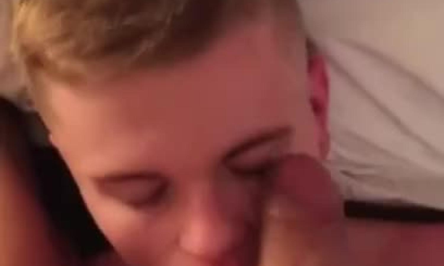 A close up of a twink getting fed cock