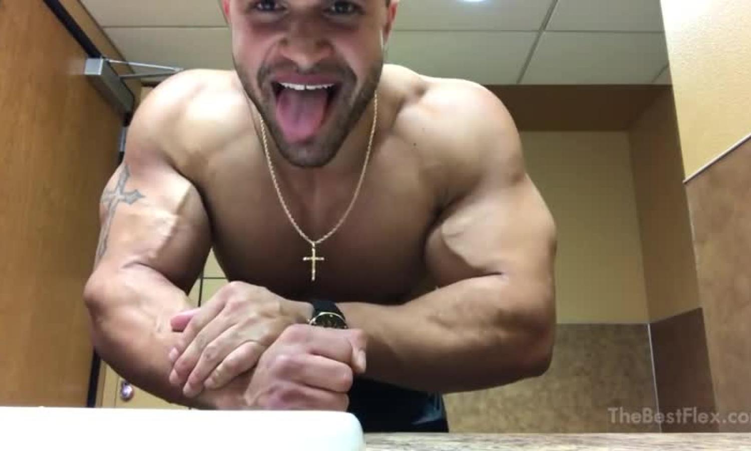 Muscle Stud shows his guns, pecs, and nips